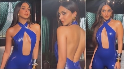 Kiara Advani poses for a photoshoot in a sizzling blue cut-out jumpsuit. (Instagram ) Kiara Advani poses for a photoshoot in a sizzling blue cut-out jumpsuit. (Instagram )