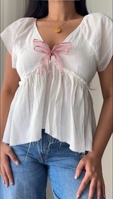 Add a bow to a top with a plunging neckline (instagram)