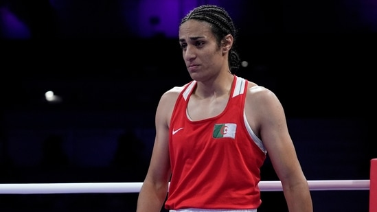 Algeria's Imane Khelif walks in the ring after fighting Italy's Angela Carini in their women's 66kg preliminary boxing match at the 2024 Summer Olympics(AP)