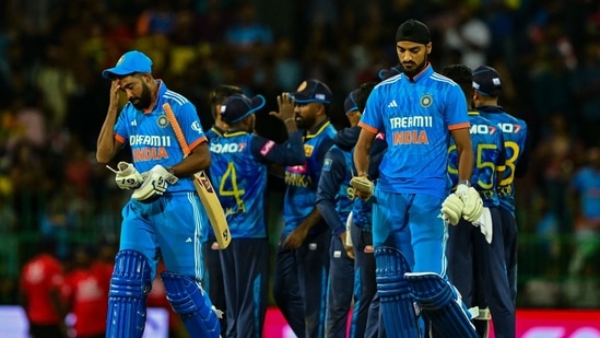 India's Arshdeep Singh (R) and Mohammed Siraj (L) walks back to the pavilion after the first one-day international (ODI) cricket match between Sri Lanka and India at the R. Premadasa International Cricket Stadium(AFP)