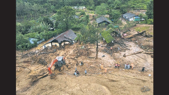 Damaged houses at a landslide site in Wayanad district on Friday. (REUTERS)