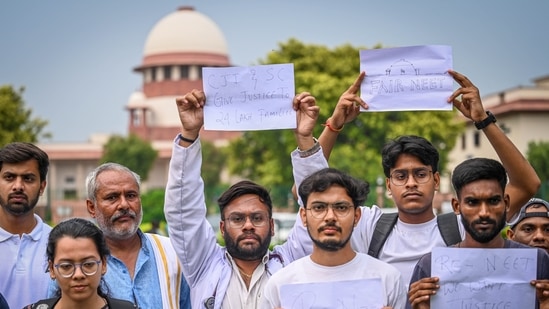 NEET aspirants assembles on the Supreme court of India premises during a hearing on NEET paper leak case in New Delhi. (Sanchit Khanna/HT)