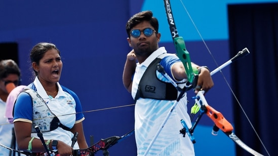 Ankita Bhakat and Dhiraj Bommadevara of India compete in the archery mixed team event at the Paris Olympics(REUTERS)
