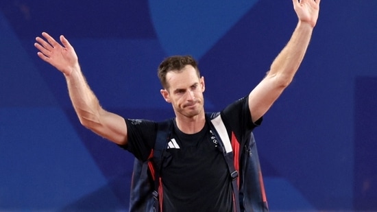 Andy Murray of Britain waves to spectators.(REUTERS)