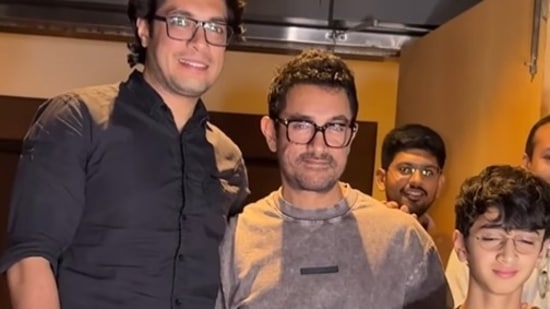 Junaid Khan, Aamir Khan, and Azad Khan clicked posing together at an event