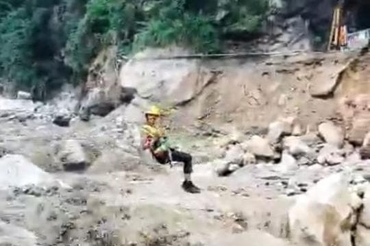 A trapped worker being rescued by the NDRF at the Malana hydel project on Friday. A trapped worker being rescued by the NDRF at the Malana hydel project on Friday.