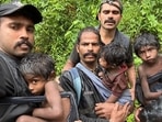 A four-member team led by Kalpetta range forest officer K Hashis rescued the tribal family which included four kids aged between one and four. A four-member team led by Kalpetta range forest officer K Hashis rescued the tribal family which included four kids aged between one and four.