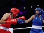 Imane Khelif of Algeria and Angela Carini of Italy in action. 