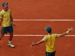 Matthew Ebden of Australia and John Peers of Australia celebrate after winning gold against Austin Krajicek of United States and Rajeev Ram of United States