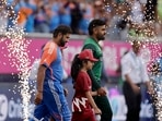 Pakistan's captain Babar Azam, right, and India's captain Rohit Sharma during 2024 T20 World Cup. Pakistan's captain Babar Azam, right, and India's captain Rohit Sharma during 2024 T20 World Cup.