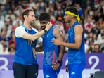 India's Satwiksairaj Rankireddy and Chirag Shetty with coach Mathias Boe after their men's doubles quarterfinal badminton match against Malaysia's Aaron Chia and Soh Wooi Yik(PTI) India's Satwiksairaj Rankireddy and Chirag Shetty with coach Mathias Boe after their men's doubles quarterfinal badminton match against Malaysia's Aaron Chia and Soh Wooi Yik(PTI)