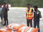 A video shared by news agency ANI showed helicopters airlifting stranded tourists and delivering fodder to the impacted animals.(ANI) A video shared by news agency ANI showed helicopters airlifting stranded tourists and delivering fodder to the impacted animals.(ANI)
