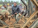 The images of Major Sita Ashok Shelke, the only woman officer in the Indian Army's Madras Engineering Group, responsible for building the bridge, stands out amid numerous pictures of the disaster's devastation. The images of Major Sita Ashok Shelke, the only woman officer in the Indian Army's Madras Engineering Group, responsible for building the bridge, stands out amid numerous pictures of the disaster's devastation.