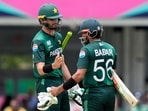 Pakistan's Shaheen Shah Afridi, left, celebrates with captain Babar Azam after Pakistan won the ICC Men's T20 World Cup cricket match against Ireland