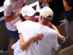 Poland's Iga Swiatek celebrates with her father Tomasz Swiatek