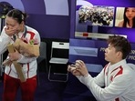 Liu Yuchen of China proposes to teammate Ya Qiong Huang of China after she won the gold.
