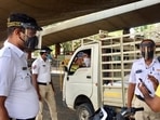 Traffic police checking vehicles in Bengaluru. (ANI Photo) Traffic police checking vehicles in Bengaluru. (ANI Photo)