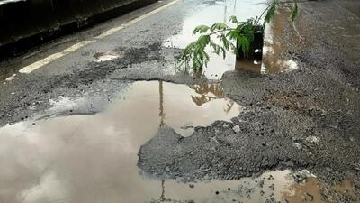 A road in Katraj area filled with potholes. (Mahendra Kolhe/HT photo)