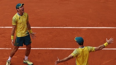 Matthew Ebden of Australia and John Peers of Australia celebrate after winning gold against Austin Krajicek of United States and Rajeev Ram of United States (REUTERS)