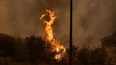 The Park Fire burns near Chico, California, US, on Friday, July 26, 2024. Arson investigators in California arrested a man on suspicion of starting the state�s largest wildfire this year - a conflagration that has prompted evacuations and threatened the state�s power grid. Photographer: Benjamin Fanjoy/Bloomberg (Bloomberg) The Park Fire burns near Chico, California, US, on Friday, July 26, 2024. Arson investigators in California arrested a man on suspicion of starting the state�s largest wildfire this year - a conflagration that has prompted evacuations and threatened the state�s power grid. Photographer: Benjamin Fanjoy/Bloomberg (Bloomberg)