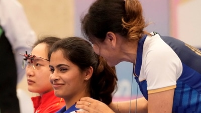 India's Manu Bhaker with her coach during the 25m Pistol Women's final event at the Paris Olympics (PTI) India's Manu Bhaker with her coach during the 25m Pistol Women's final event at the Paris Olympics (PTI)