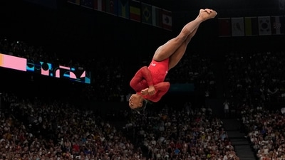 Simone Biles, of the United States, competes during the women's artistic gymnastics individual vault finals at Bercy Arena at the 2024 Summer Olympics, Saturday, Aug. 3, 2024, in Paris, France. (AP Photo/Francisco Seco) (AP) Simone Biles, of the United States, competes during the women's artistic gymnastics individual vault finals at Bercy Arena at the 2024 Summer Olympics, Saturday, Aug. 3, 2024, in Paris, France. (AP Photo/Francisco Seco) (AP)