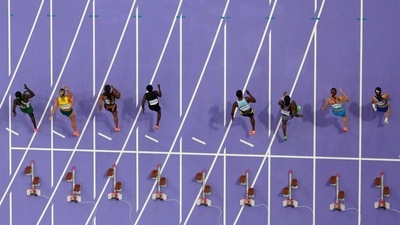 Lane five, assigned to Shelly-Ann Fraser-Pryce, of Jamaica, is empty during the women's 100m semifinal. (AP) Lane five, assigned to Shelly-Ann Fraser-Pryce, of Jamaica, is empty during the women's 100m semifinal. (AP)