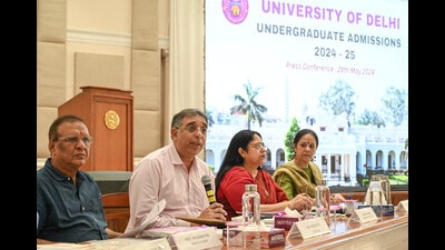 Vikas Gupta, registrar of Delhi University, along with other DU officials addresses a press conference for the admission process for the academic year 2024 -2025 at VC Office, North Campus in New Delhi in May. (Sanchit Khanna/HT Photo) Vikas Gupta, registrar of Delhi University, along with other DU officials addresses a press conference for the admission process for the academic year 2024 -2025 at VC Office, North Campus in New Delhi in May. (Sanchit Khanna/HT Photo)