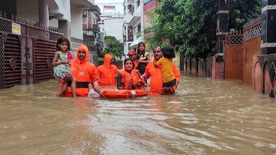 Ranchi: NDRF personnel rescue people from their flood-affected residence after heavy rains, in Ranchi, Friday, Aug. 2, 2024 (PTI) Ranchi: NDRF personnel rescue people from their flood-affected residence after heavy rains, in Ranchi, Friday, Aug. 2, 2024 (PTI)