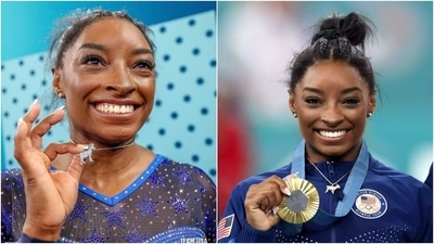 Simone Biles wears a 'GOAT' necklace for cinching the Paris Olympics gold win. (Instagram ) Simone Biles wears a 'GOAT' necklace for cinching the Paris Olympics gold win. (Instagram )