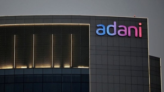 The logo of the Adani Group is seen on the facade of one of its buildings on the outskirts of Ahmedabad, India, April 13, 2021. (Amit Dave/Reuters)