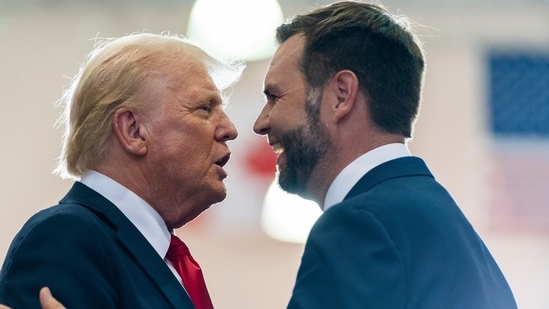 Republican presidential candidate former President Donald Trump, left, greets Republican vice presidential candidate Sen. JD Vance, R-Ohio, before speaking at a campaign rally, Saturday, July 27, 2024, in St. Cloud, Minn. (AP Photo/Alex Brandon)(AP)