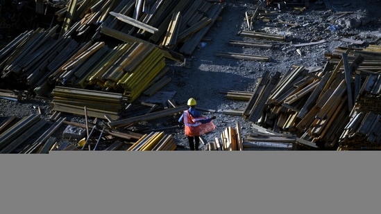 A worker at a construction site on the Mumbai Coastal Road in Mumbai, India, Monday, March 4, 2024. (Bloomberg)