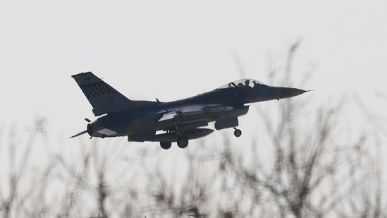 A US Air Force F-16 fighter jet flies.(AFP)