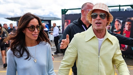 Ines de Ramon and Brad Pitt at the British Grand Prix.