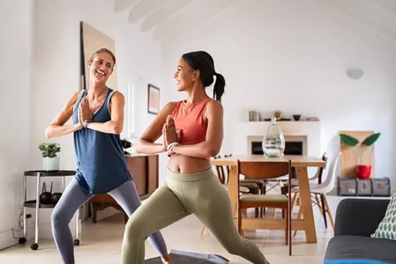 Doing yoga with best friend.