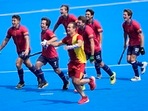 Spanish players celebrate after their win against Belgium in the men's quarterfinal field hockey match at the Yves-du-Manoir Stadium during the 2024 Summer Olympics, Sunday, Aug. 4, 2024, in Colombes, France.AP/PTI(AP08_04_2024_000339A)