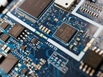 Semiconductor chips are seen on a circuit board of a computer in this illustration picture taken February 25, 2022. (Florence Lo/Reuters)