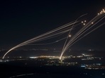 The Israeli Iron Dome air defense system fires to intercept an attack from Lebanon over the Galilee region as seen from the Israeli-annexed Golan Heights, Sunday, Aug. 4, 2024. (AP Photo/Leo Correa) The Israeli Iron Dome air defense system fires to intercept an attack from Lebanon over the Galilee region as seen from the Israeli-annexed Golan Heights, Sunday, Aug. 4, 2024. (AP Photo/Leo Correa)