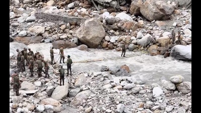 Army personnel during the rescue and restoration work following a cloudburst, at Samej village, in Rampur of Himachal Pradesh, on Sunday. (PTI)