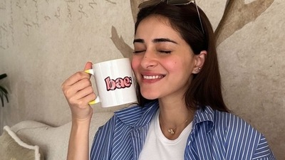 Ananya Panday exuded contemporary charm as she stepped out for coffee with friends on Friendship Day, in a sensational co-ord set that came with a blue and white striped oversized shirt and a pair of matching shorts, teamed with a white crop top. (Photo by Twitter/Dapitup69)