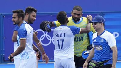 India’s men’s hockey team celebrates their quarter-final win over Britain at the Paris Olympics on Sunday. (AP)