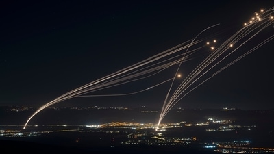 The Israeli Iron Dome air defense system fires to intercept an attack from Lebanon over the Galilee region as seen from the Israeli-annexed Golan Heights, Sunday, Aug. 4, 2024. (AP Photo/Leo Correa) The Israeli Iron Dome air defense system fires to intercept an attack from Lebanon over the Galilee region as seen from the Israeli-annexed Golan Heights, Sunday, Aug. 4, 2024. (AP Photo/Leo Correa)