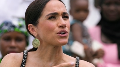 Meghan Markle watches her husband Prince Harry play in an exhibition sitting volleyball match, in Abuja, Nigeria, Saturday, May 11, 2024 (AP) Meghan Markle watches her husband Prince Harry play in an exhibition sitting volleyball match, in Abuja, Nigeria, Saturday, May 11, 2024 (AP)