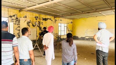 Officials during inspection at the Nehru stadium in Faridkot on Sunday. Officials during inspection at the Nehru stadium in Faridkot on Sunday.