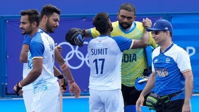 India's Harmanpreet Singh, second left, reacts as he celebrates with teammates after their win in the men's quarterfinal field hockey match against Britain at the Yves-du-Manoir Stadium during the 2024 Summer Olympics (AP) India's Harmanpreet Singh, second left, reacts as he celebrates with teammates after their win in the men's quarterfinal field hockey match against Britain at the Yves-du-Manoir Stadium during the 2024 Summer Olympics (AP)