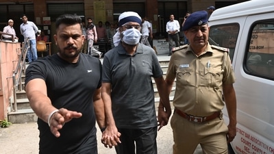 Police arresting the accused from the mediation centre of district court Chandigarh on Saturday. (Ravi Kumar/Hindustan Times) Police arresting the accused from the mediation centre of district court Chandigarh on Saturday. (Ravi Kumar/Hindustan Times)