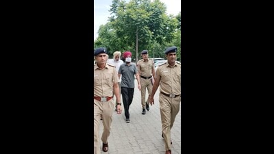 Retired Punjab assistant inspector general (AIG) Malvinder Singh Sidhu was sent to two-day police remand on Sunday. (HT Photo) Retired Punjab assistant inspector general (AIG) Malvinder Singh Sidhu was sent to two-day police remand on Sunday. (HT Photo)