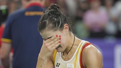 Spain's Carolina Marin exited the Olympics after suffering an injury against China's He Bingjiao during their women's singles badminton semi-final on Sunday. (AP) Spain's Carolina Marin exited the Olympics after suffering an injury against China's He Bingjiao during their women's singles badminton semi-final on Sunday. (AP)