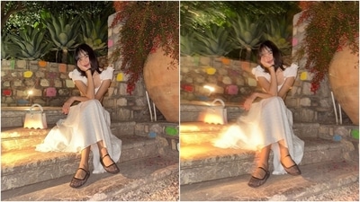 Lisa wore a white embroidered bralette and a maxi skirt in the photos. The top features a super cropped hem flaunting her svelte frame, a wide neckline, puffed half-length sleeves, white rose adornments embroidered on the shoulders, floral eyelet embroidery, and a fitted bust. (Instagram) Lisa wore a white embroidered bralette and a maxi skirt in the photos. The top features a super cropped hem flaunting her svelte frame, a wide neckline, puffed half-length sleeves, white rose adornments embroidered on the shoulders, floral eyelet embroidery, and a fitted bust. (Instagram)